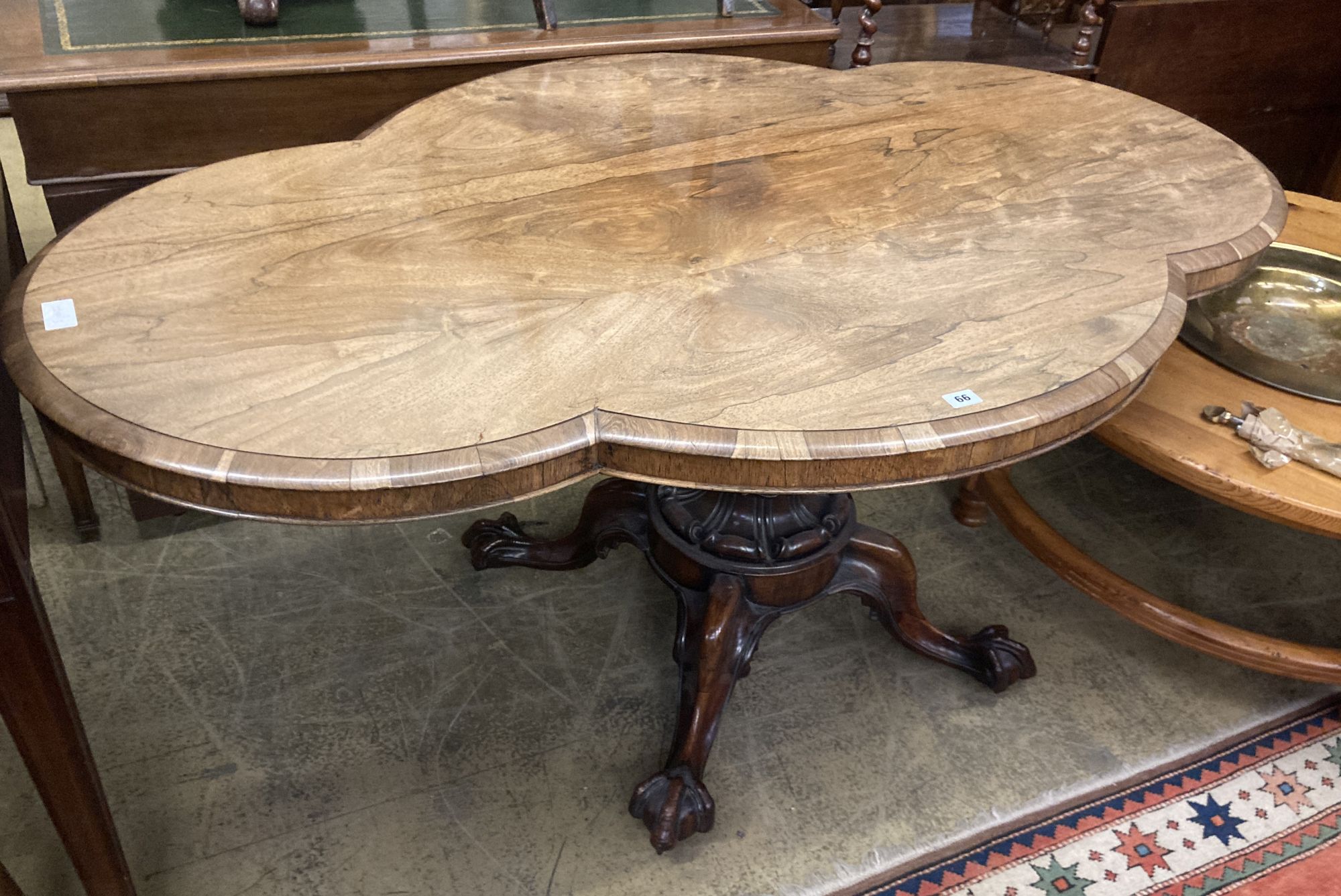 A Victorian shaped oval rosewood loo table, width 150cm depth 98cm height 72cm